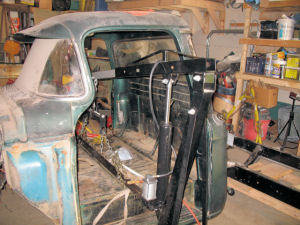 Interior gutted and Cab removed from frame
